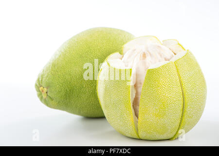 fresh and peeled pomelo(shaddock), grapefruit with slices isolated on white background Stock Photo