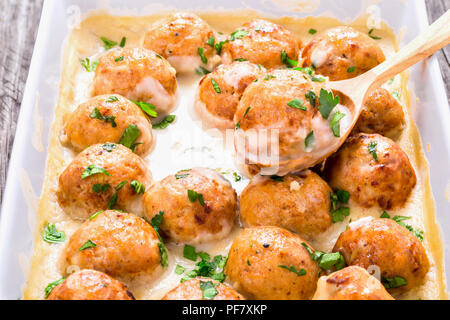 meatballs  in a creamy gravy sauce, close-up Stock Photo