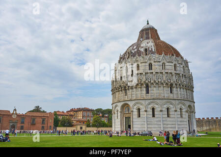 Pisa / Tuscany / Italy / May 2018 : Large Number Of Tourists Visit The Battistero Di San Giovanni Stock Photo