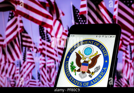 Seal of United States Department of State seen displayed on a smart phone. Stock Photo