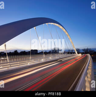 View of bridge at dusk. Cittadella Bridge, Alessandria, Italy. Architect: Richard Meier and Partners, 2017. Stock Photo