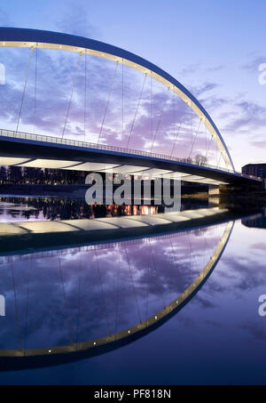 View of bridge at sunset. Cittadella Bridge, Alessandria, Italy. Architect: Richard Meier and Partners, 2017. Stock Photo