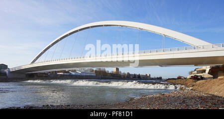 View of the Cittadella bridge across the River Tanaro. Cittadella Bridge, Alessandria, Italy. Architect: Richard Meier and Partners, 2017. Stock Photo