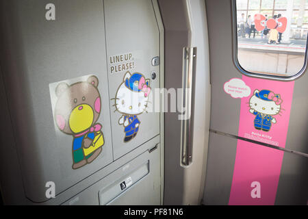 The interior of the Hello Kitty shinkansen (Hello Kitty bullet train), which is decorated with Hello Kitty and other Sanrio characters. Japan. Stock Photo