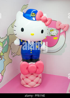 Hello Kitty, in a Japan Rail train conductor uniform, aboard the special Hello Kitty shinkansen (Hello Kitty bullet train). Japan. Stock Photo