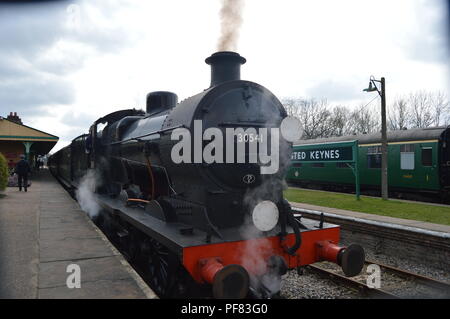 Vintage steam train waiting in a station Stock Photo