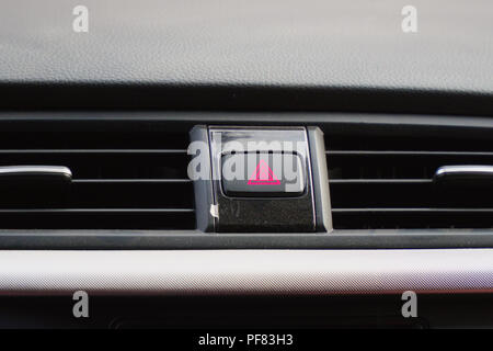 Emergency button on the car panel Stock Photo