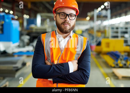 Bearded Businessman Wearing Hardhat Stock Photo