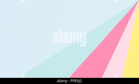 Abstract geometrical pastel blue, yellow and pink paper flat lay background. Minimalism, geometry and symmetry template. Stock Photo