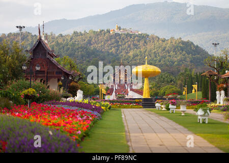 One of the most popular among tourists Buddhist temples of Thailand The Royal Pavilion (Ho Kham Luang) against the backdrop of picturesque nature Stock Photo