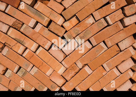 Stack of red bricks as a background or texture Stock Photo