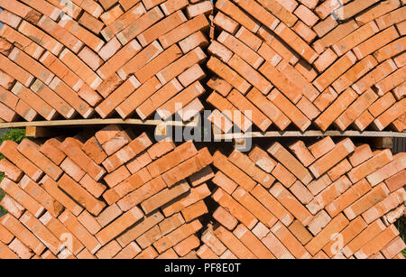 Stack of red bricks as a background or texture Stock Photo