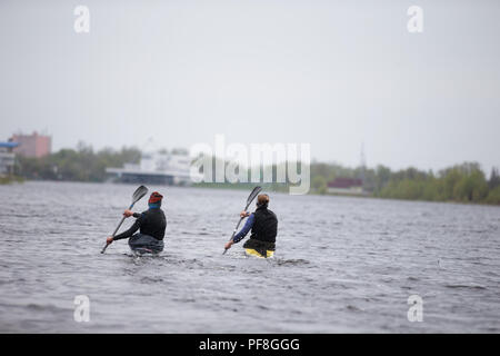 Belarus, Gomel, 25 April 2018. Training in rowing. Athletes rowing with oars Stock Photo