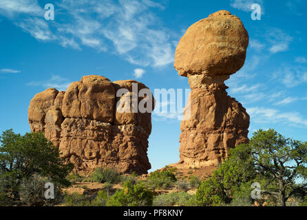 Balanced Rock, Arches National Park, Utah; USA - A Spectacular Orange Rock Formation with Blue Sky Stock Photo