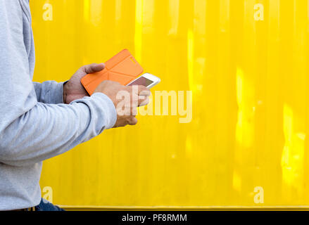 Business man using cell phone on construction site Stock Photo