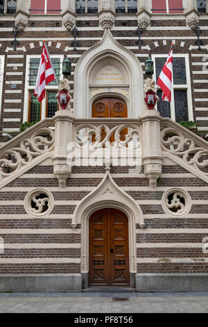Alkmaar, Netherlands - June 01, 2018: Stairs to the entrance of the townhall of Alkmaar decorated with lions that carry the coat of arms Stock Photo