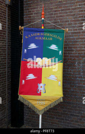Alkmaar, Netherlands - July 20, 2018: Traditional colorful banner of the cheese carriers guild of Alkmaar Stock Photo