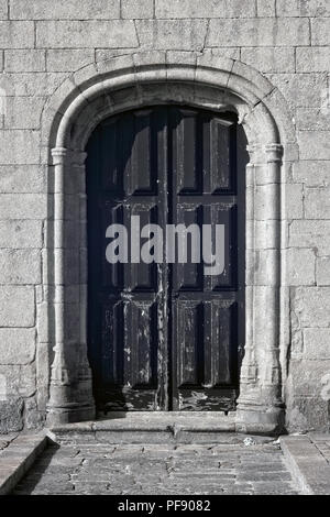 Lateral door and stone work of the sixteenth century Azurara mother church, Vila do Conde, Portugal Stock Photo