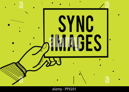 Handwriting text Sync Images. Concept meaning Making photos identical in all devices Accessible anywhere Man hand holding paper communicating informat Stock Photo