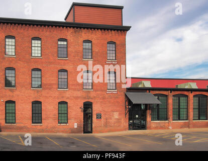 Syracuse, New York, USA. August 11, 2018. The Foundry, a former industrial site, renovated into commercial office space in the upscale, historic Frank Stock Photo