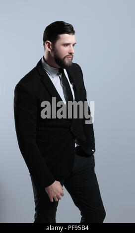 side view.portrait of a serious businessman.isolated on grey background Stock Photo