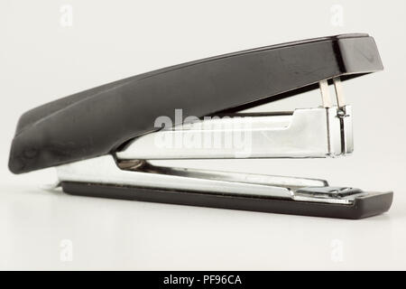 new stapler for stapling papers on a table Stock Photo