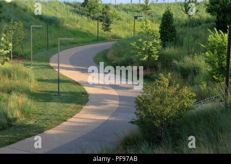 Winding path through Gateway Arch National Park area in downtown Saint Louis, Missouri Stock Photo