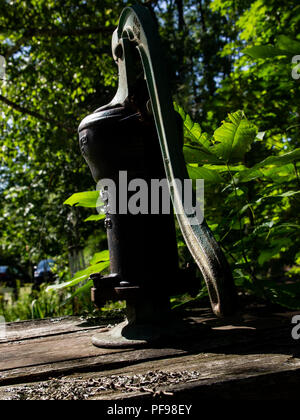 Traditional Cast Iron Manual Water Pump Stock Photo