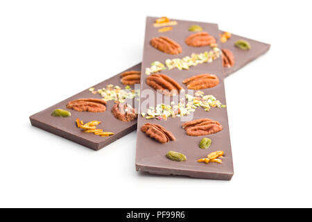Chocolate bar with various nuts isolated on white background. Stock Photo
