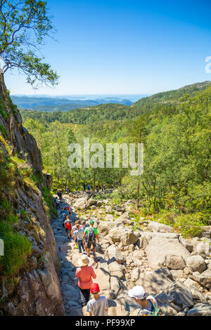 Preikestolen, Norway - 30.06.2018: Peole on Hiking footpath to the Preikestolen and Lysefjord area, Norway Stock Photo