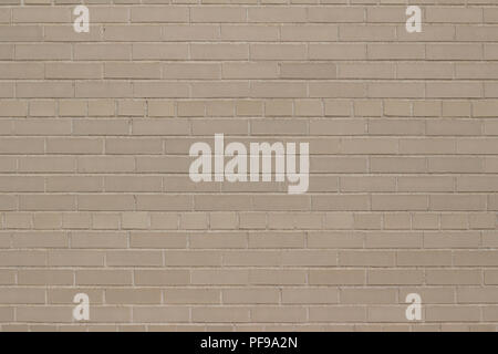Attractive weathered light grey or beige brick wall background with a Scottish bond brickwork pattern Stock Photo