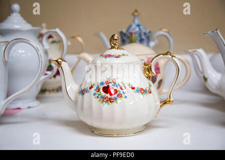 Ladies tea at a North Florida church, featuring antique and fine china and teapots. Stock Photo