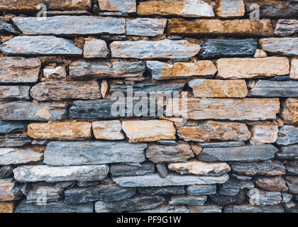 Stone wall texture, mud joints Stock Photo