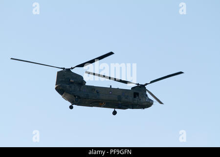 Tandem rotor U.S. Army Helicopter in flight Stock Photo