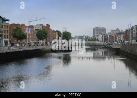 Dublin City viewed from Capel Street Bridge with the Halfpenny Bridge,O'Connell Bridge and Liberty Hall included in the cityscape. Stock Photo