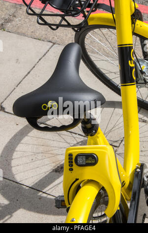 Ofo,company,bicycle,bike,for,rent,hire,on,the,street,near,Victoria,Station,London,England,UK,GB,Britain,The,bikes,accessed,via,phone,app,no,docking, Stock Photo