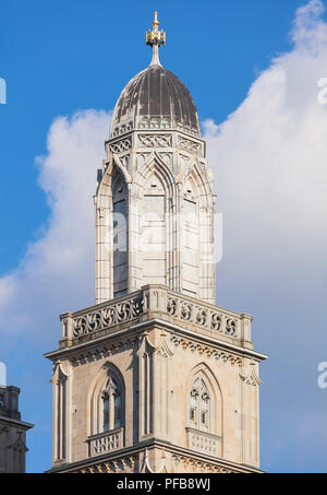 One of the two towers of the Grossmunster cathedral in Zurich, Switzerland. The cathedral is a well-known architectural landmark of the city. Stock Photo