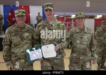 The Maryland Army National Guard hosted the change of command and change of responsibility ceremony at the historic 5th Regiment Armory in Baltimore, Maryland on June 2, 2018. Col. Janeen L. Birckhead assumed command of the Maryland Army National Guard from Brig. Gen. Timothy E. Gowen. Command Sgt. Maj. James M. Nugent assumed responsibility as the senior enlisted leader of the Maryland Army National Guard from Command Sgt. Maj. Kimberly A. Mendez.     Maj. Gen. Linda L. Singh, 29th Adjutant General of the Maryland National Guard, presided over the ceremony. In attendance were units from Joint Stock Photo