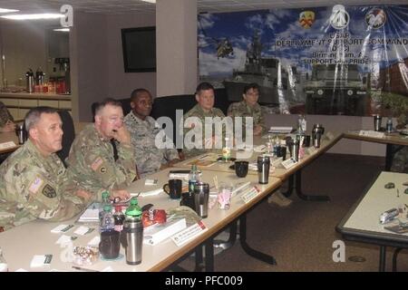 During the USTRANSCOM Commander's visit to the Deployment Support Command, senior leadership discusses the DSC requirements and array of forces upon mobilization in support of the Joint Deployment and Distribution Enterprise. (pictured left to right) Maj. Gen. Steven Ainsworth, commander of the 377th Theater Sustainment Command in New Orleans, Louisiana; Maj. Gen. Stephen Farmen, commanding general of SDDC in Scott Air Force Base, Illinois; Gen. Darren McDew, commanding general United States Transportation Command at Scott Air Force Base, Illinois; Brig. Gen. Martin Klein, commanding general o Stock Photo