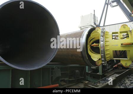 Russia. 21st Aug, 2018. Before the pipes can be welded its ends have to be machined. On board the C6, which was docked at the Port of Rotterdam in February 2010 for retrofitting, test pipes without concrete weight coating were bevelled to test the equipment. The photo shows a pipe following bevelling. Credit: Nord Stream Ag/Russian Look/ZUMA Wire/Alamy Live News Stock Photo