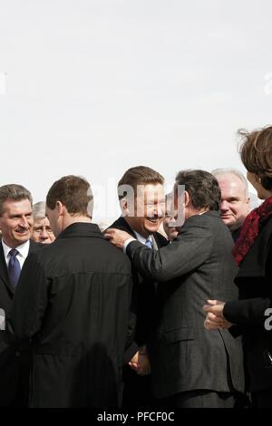 Russia. 21st Aug, 2018. Russian President Dimitri Medvedev (left), former German Chancellor, Gerhard Schrder (right) shaking hands at the April 9, 2010 event to celebrate the start of construction of the Nord Stream Pipeline. Portovaya Bay, Russia. In back from left to right, Gnther Oettinger, European Commissioner for Energy, and Matthias Warnig, Managing Director Nord Stream. Credit: Nord Stream Ag/Russian Look/ZUMA Wire/Alamy Live News Stock Photo