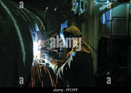 Russia. 21st Aug, 2018. Before being laid on the seabed the pipes are welded and sealed on the pipelay vessel. Single joints are welded on to the main pipeline in the central assembly line. Each weld undergoes ultrasonic testing. Credit: Nord Stream Ag/Russian Look/ZUMA Wire/Alamy Live News Stock Photo