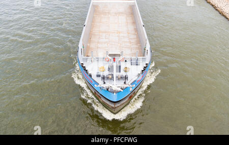 21 August 2018, Germany, Düsseldorf: An inland vessel travels on the Rhine without payload. Photo: Christophe Gateau/dpa Stock Photo