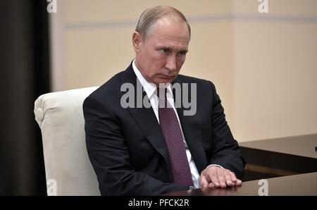 Novo-Ogaryovo residence, Russia. 21st August, 2018. Russian President Vladimir Putin during a meeting with Yamalo-Nenets Autonomous Area Acting Governor Dmitry Artyukhov at the Novo-Ogaryovo residence August 21, 2018 outside Moscow, Russia. Credit: Planetpix/Alamy Live News Stock Photo