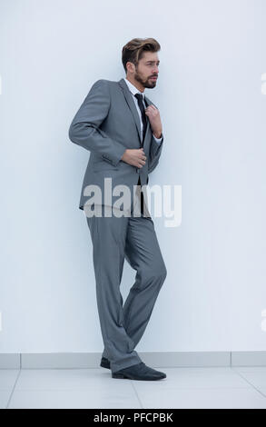 side view of an arrogant stylish man in suit Stock Photo