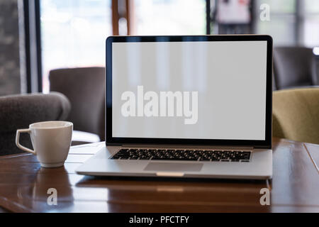 mock up Using laptop with blank screen computer modern Stock Photo