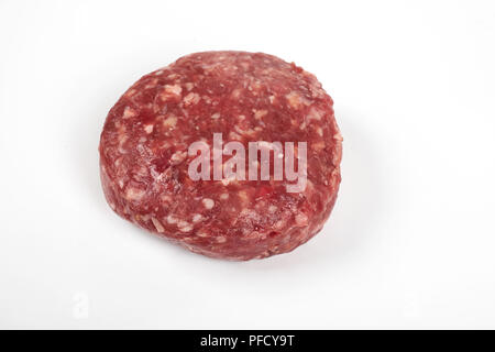 Raw fresh large beef burger or cutlets isolated on white background Stock Photo