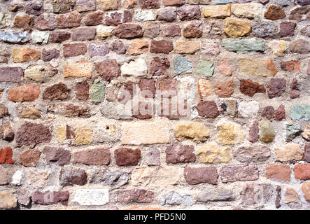 France, Provence, wall made from coloured stone bricks Stock Photo