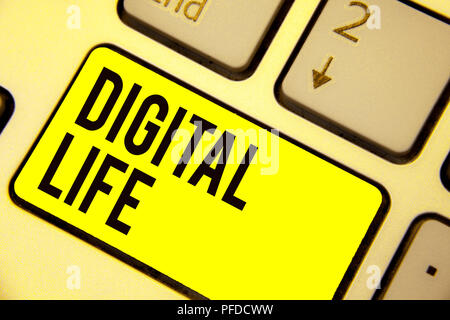 Word writing text Digital Life. Business concept for Living in a world interconnected through Internet Multimedia Keyboard yellow key Intention create Stock Photo