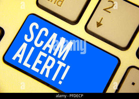 Text sign showing Scam Alert. Conceptual photo warning someone about scheme or fraud notice any unusual Keyboard blue key Intention create computer co Stock Photo